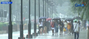 Families Celebrate Christmas in the Rain at Rizal Park - Pinas Times